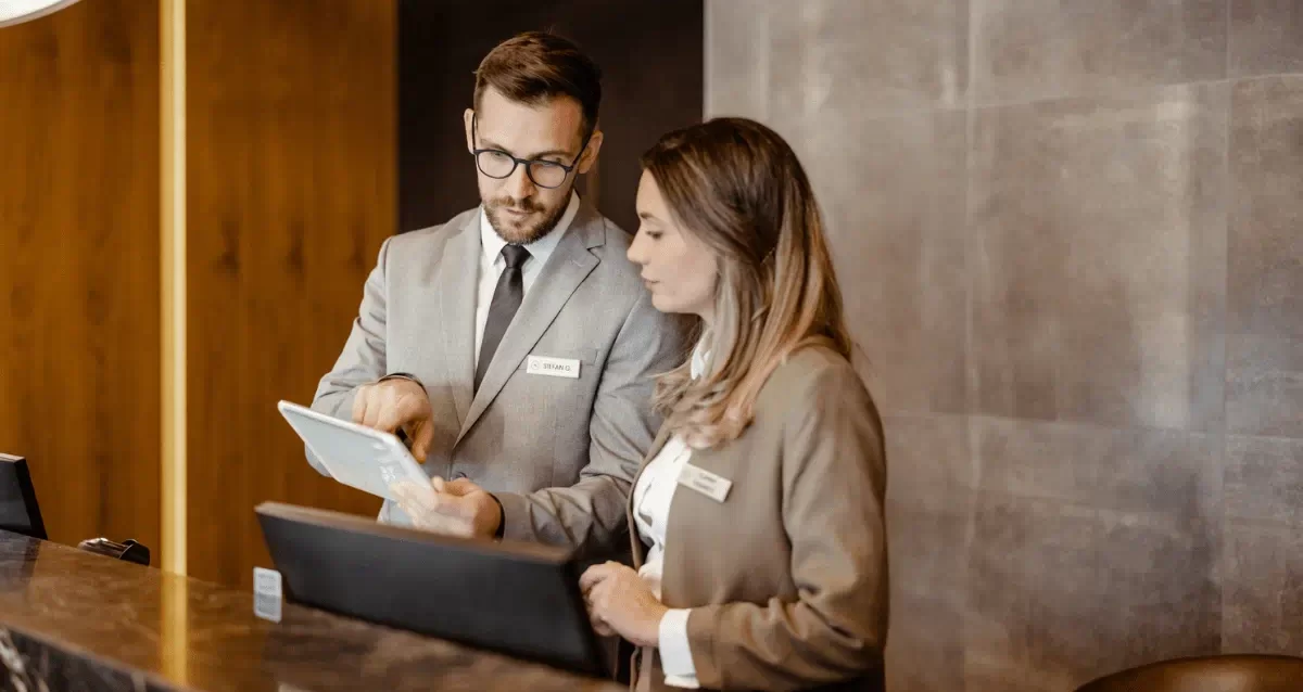 Digital hotel check-in form on tablet, reducing wait times