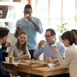 Business professional reviewing automated questionnaire dashboard showing real-time workflow triggers and instant data processing eliminating manual entry