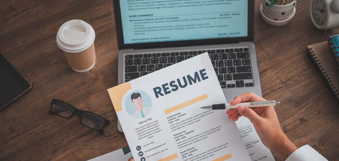 shutterstock_2592616215-compressed HR manager reviewing job application template analytics showing 70% candidate abandonment rate on dashboard